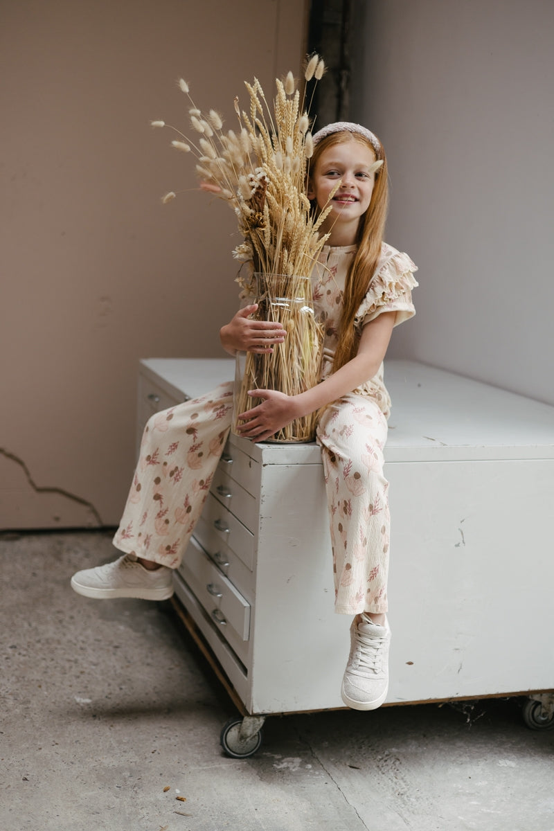Broek Créme met bloemen | AOP Pink Leaves